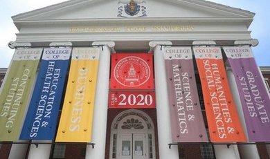 Boyden Hall with 2020 Commencement flags