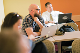 Graduate Student in classroom