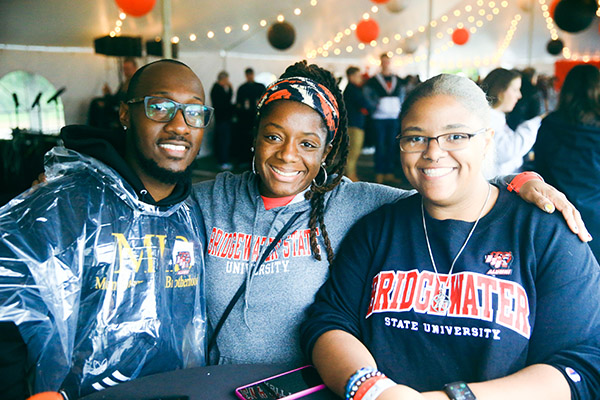 2 female and 1 male BSU alumni in the Rathskellar Alumni tent at Homecoming 2022