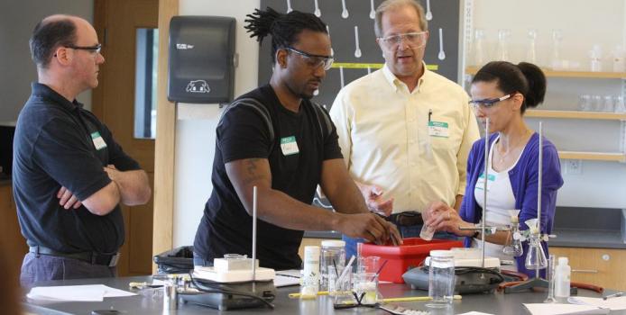 High school teachers participating in professional development workshops