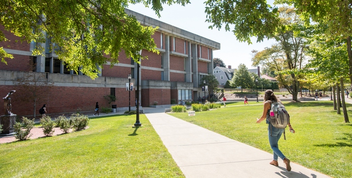 students in courtyard next to Maxwell Library