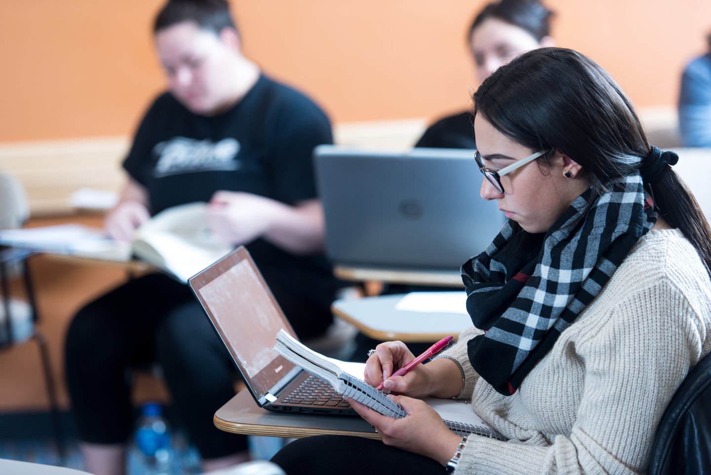 Student at desk with laptop