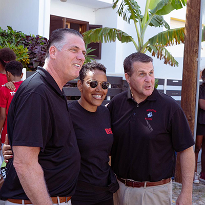 Zita Mendes, wearing a black BSU shirt, poses with members of the delegation.