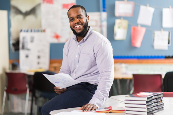 Daniel Estime, BSU Secondary Education graduate in the classroom he teaches in
