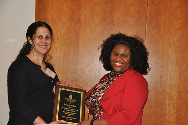 Dr. Rachel Navarre and student Daniela Belice showing Daniela's award received at the BSU MPA dinner