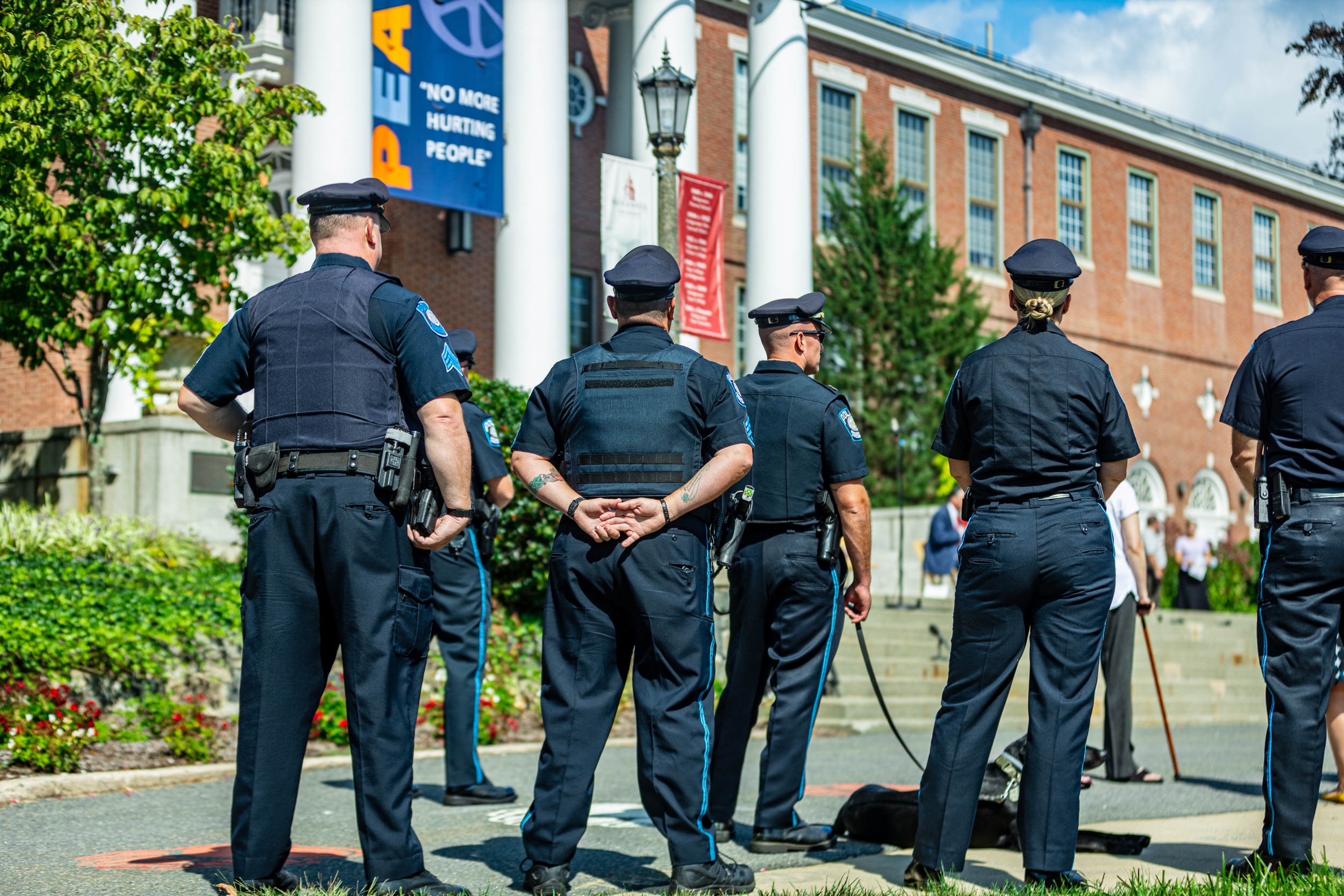 The backs of BSU police officers during an event at Boyden Hall