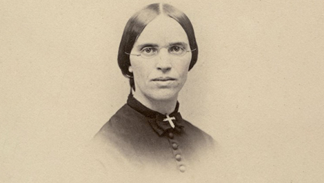 Black and white headshot of Eliza Woodward