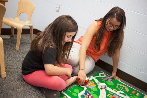 SLHC clinician with a client