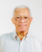 BSU Board member Francis Giles with short gray hair and silver rim glasses wearing a white button down shirt