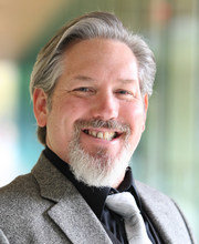 headshot photo of Dr. Michael Devalve
