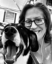 black and white photo of Lori LeComte and her dog