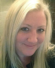 headshot photo of Dr. Nikki Freeburg smiling with long straight blond hair