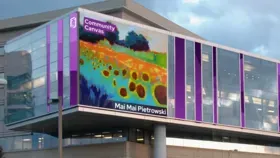 A digital photo of a painting of sunflowers