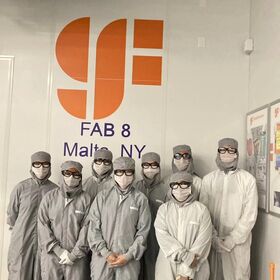 Students wear special clothing and masks before entering a clean room.