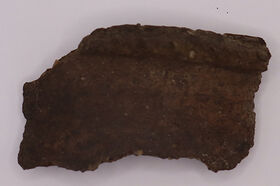 A close-up image of a piece of pottery.