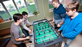 students playing fusball