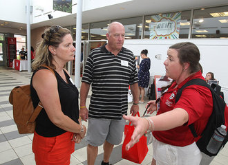 Parents getting info from an orientation leader