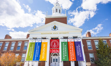 Boyden Hall with Class of 2026 graduation banners hanging in front