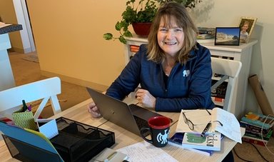 Dr. Jeanne Ingle at her dining room table