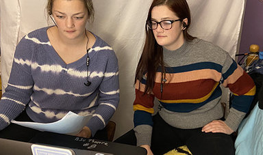 Emily and Erin O'Donnell rehearse in their home.