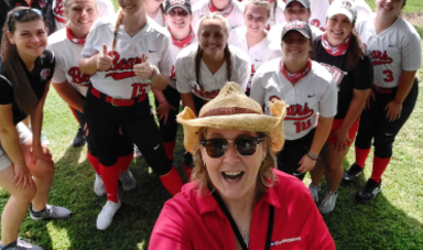 Mary Beth Lamb poses with softball team