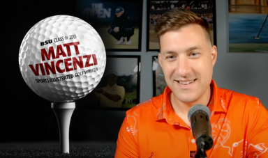 A man sits at a microphone with a golf ball graphic next to him