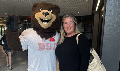 Jill Milton poses for a photo with Bristaco.