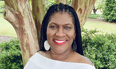 Headshot of Dorrette Bogle Stephenson in front of a tree