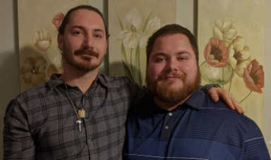 Alex Criman, '21, right, stands next to his brother Tony Sgro