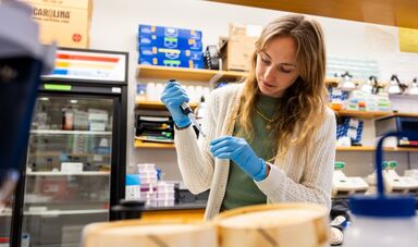 Olivia Quintin works at a lab station.