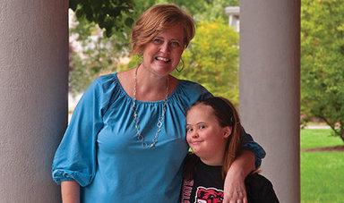 Melissa Winchell stands next to her daughter.