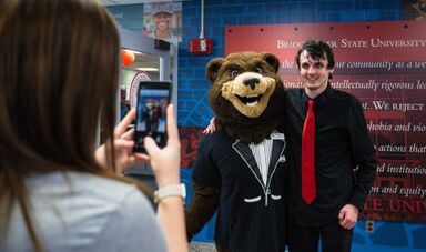 Dom Zullo poses for a photo with Bristaco.