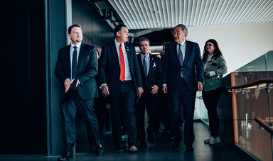 BSU President Fred Clark walking and talking with Senator Ed Markey