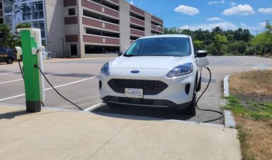 An EV charging station on east campus charging a BSU vehicle