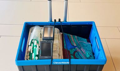 A look inside a lending lab pack - pieces are neatly packed together in a rolling caddy