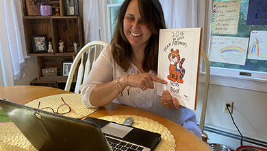 Nichole Freeman uses a computer during the pandemic to teach.