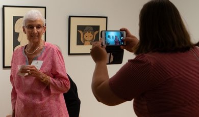 Ellen Farren poses for a photo with her collection.