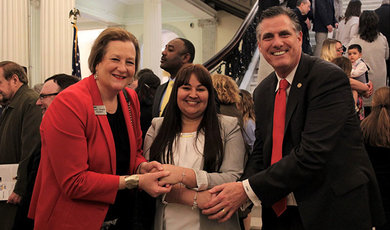 Jennifer Santana, ’22, shakes hands with Bristol President L