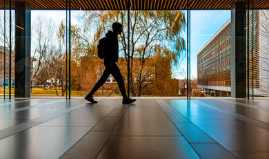 student walking in DMF