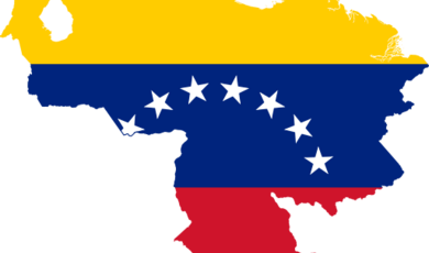 The flag of Venezuela superimposed over a map of Venezuela