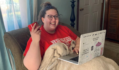 Bailey Cormier, '22 gets ready to take learning online at her home in Aschunet