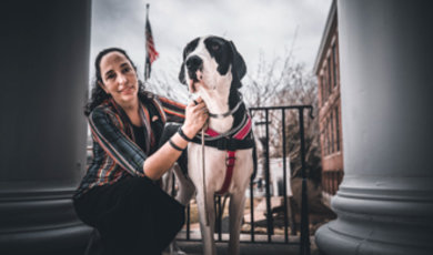 Micaila Britto and her service dog Rabbit