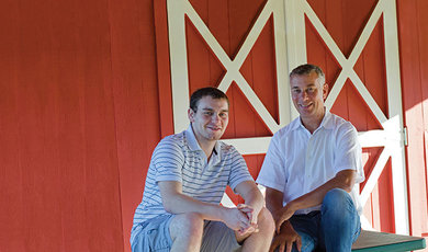 R0y Noepel, '92, and his son Eric, '19, spend time together at Adams Farm in Walpole, where the senior Noepel serves as a volunteer.