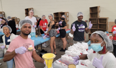 BSU volunteers pack up boxes of food for those in need 