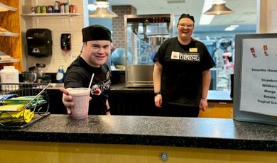 Bob Donahue places a smoothie on the Bear Trap Counter.