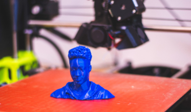 Blue Bust sitting on orange table