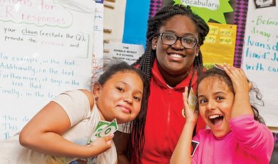 Boston students show enthusiasm when working with BSU's City Year Boston Participants.