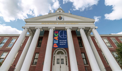 The BSU Peace Flag hanging from Boyden Hall
