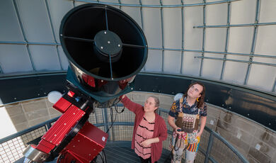 Maxfield Capron and Jamie Kern working with a new and improved telescope in the BSU observatory