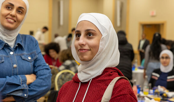Female muslim BSU student in a headscarf at a Muslim Student Association Iftar dinner